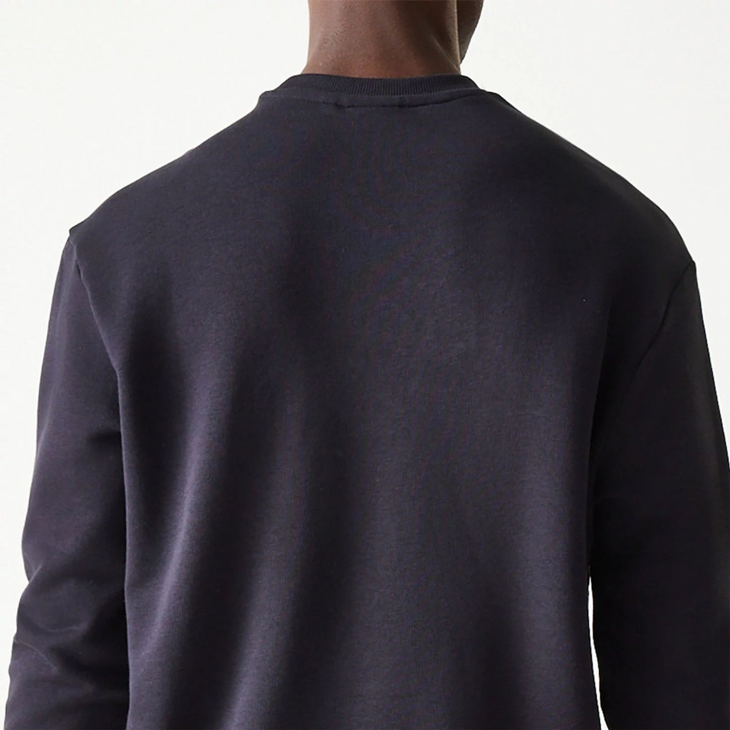 The Male model is wearing New Era Essential Navy Crewneck Sweater 7