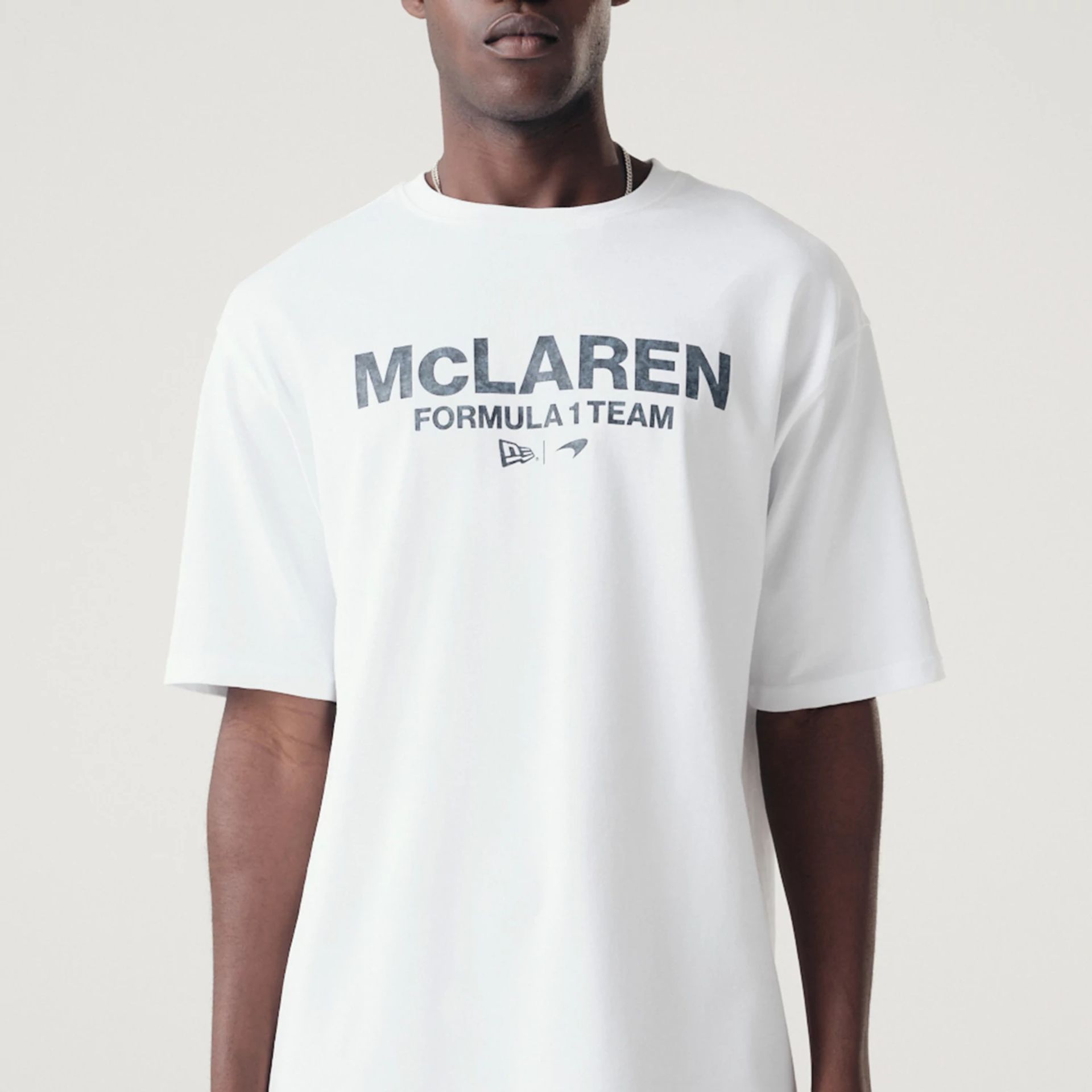 The Male model is wearing McLaren Racing Washed Pack White Oversized T-Shirt 3