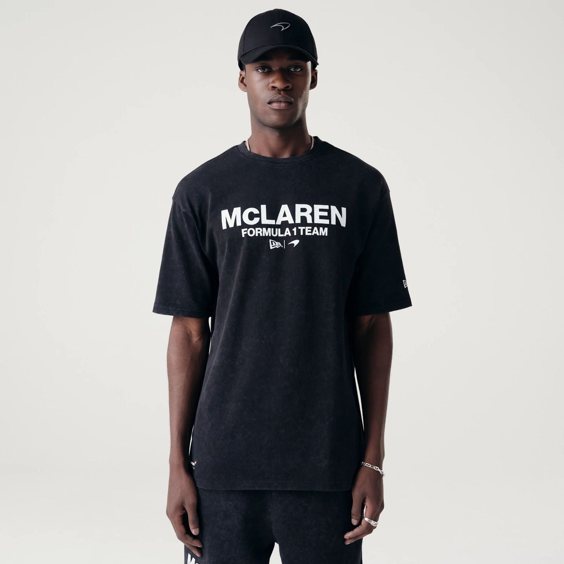 The Male model is wearing McLaren Racing Washed Pack Black Oversized T-Shirt 1