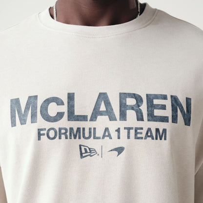 The Male model is wearing McLaren Racing Washed Pack Cream Oversized T-Shirt 4