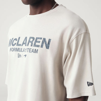 The Male model is wearing McLaren Racing Washed Pack Cream Oversized T-Shirt 5