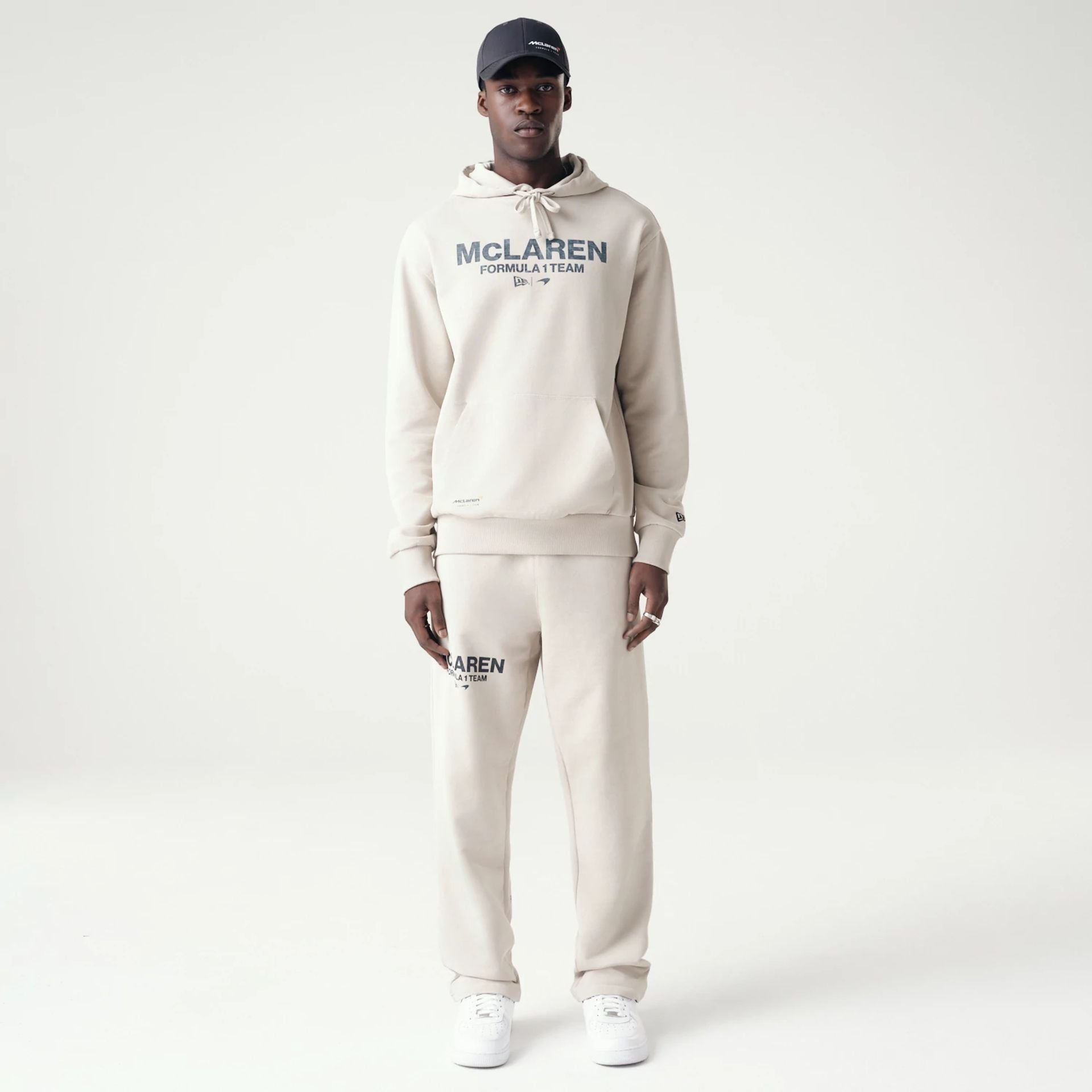 The Male model is wearing McLaren Racing Washed Pack Cream Oversized Hoodie 6