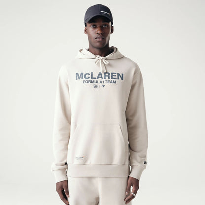 The Male model is wearing McLaren Racing Washed Pack Cream Oversized Hoodie 1