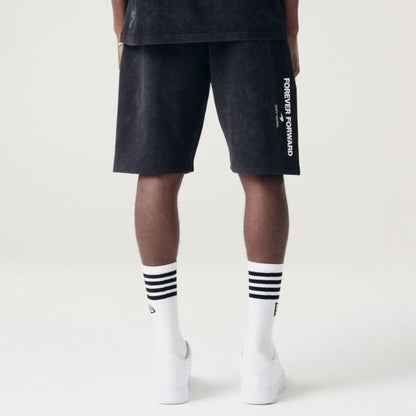 The Male model is wearing McLaren Racing Washed Pack Black Oversized Shorts 2