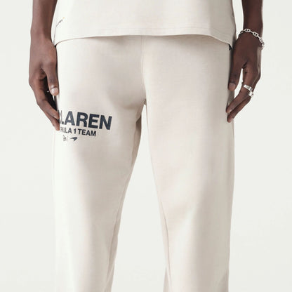 The Male model is wearing McLaren Racing Washed Pack Cream Straight Leg Joggers 3