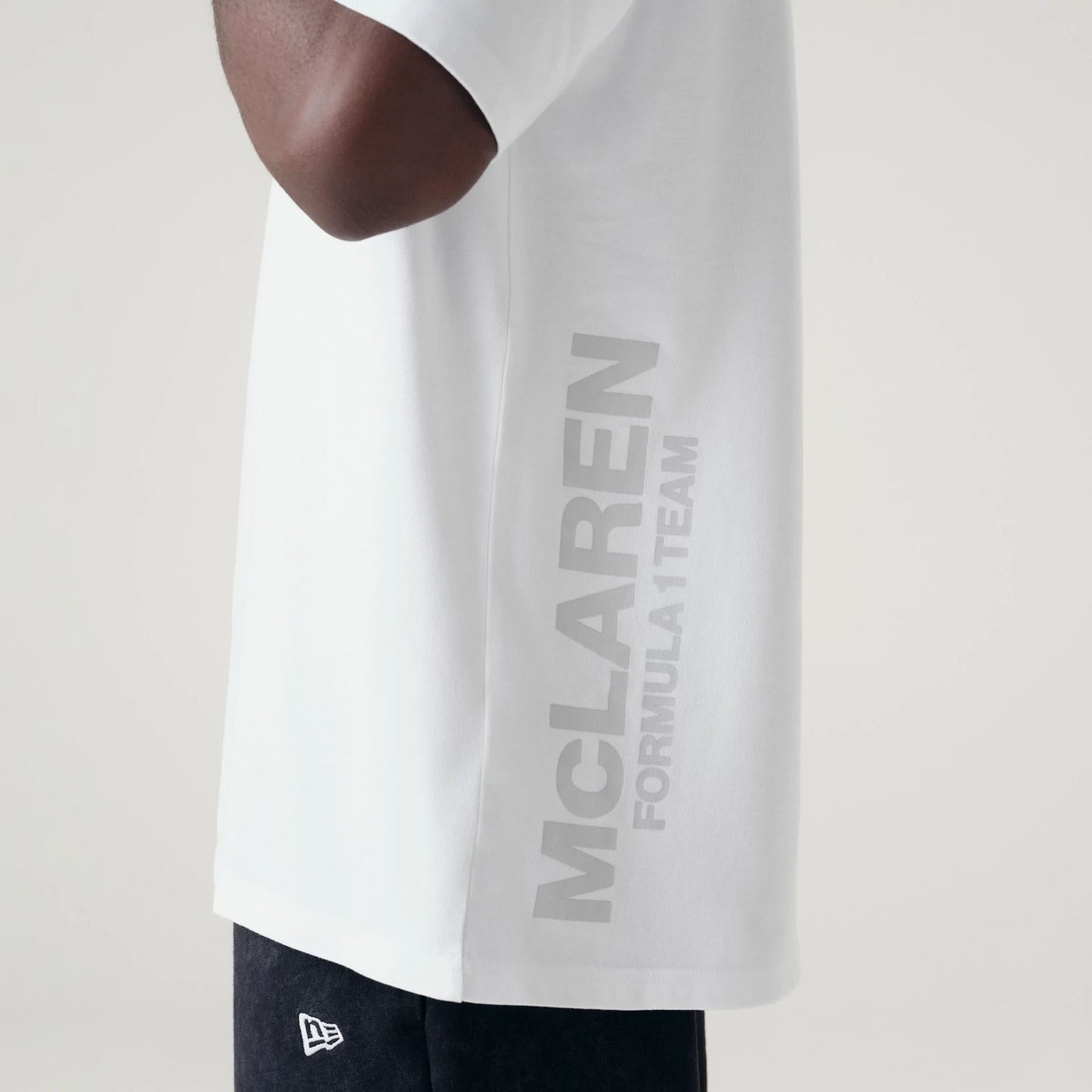 The Male model is wearing McLaren Racing Washed Pack White Oversized T-Shirt 4