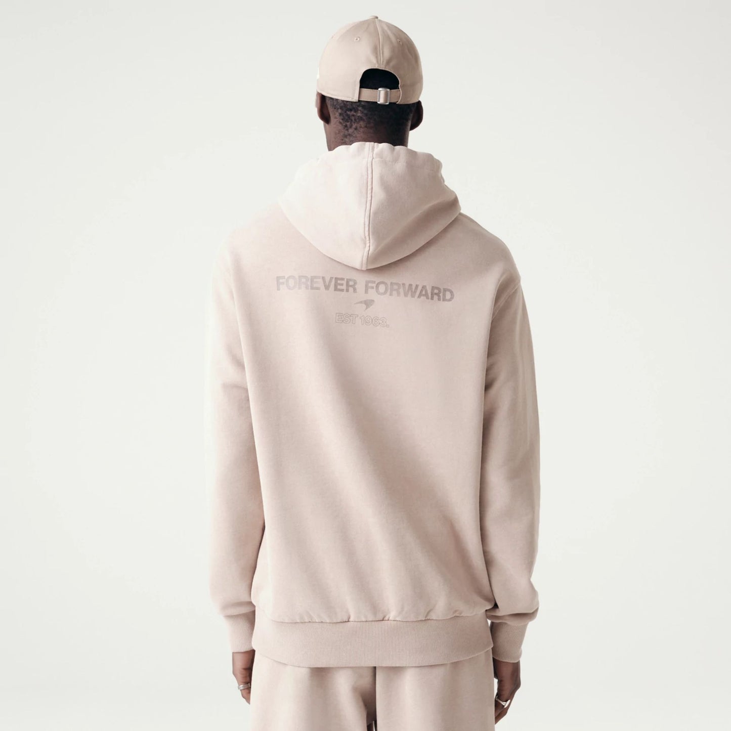 The Male model is wearing McLaren Racing Washed Pack Beige Oversized Hoodie 2