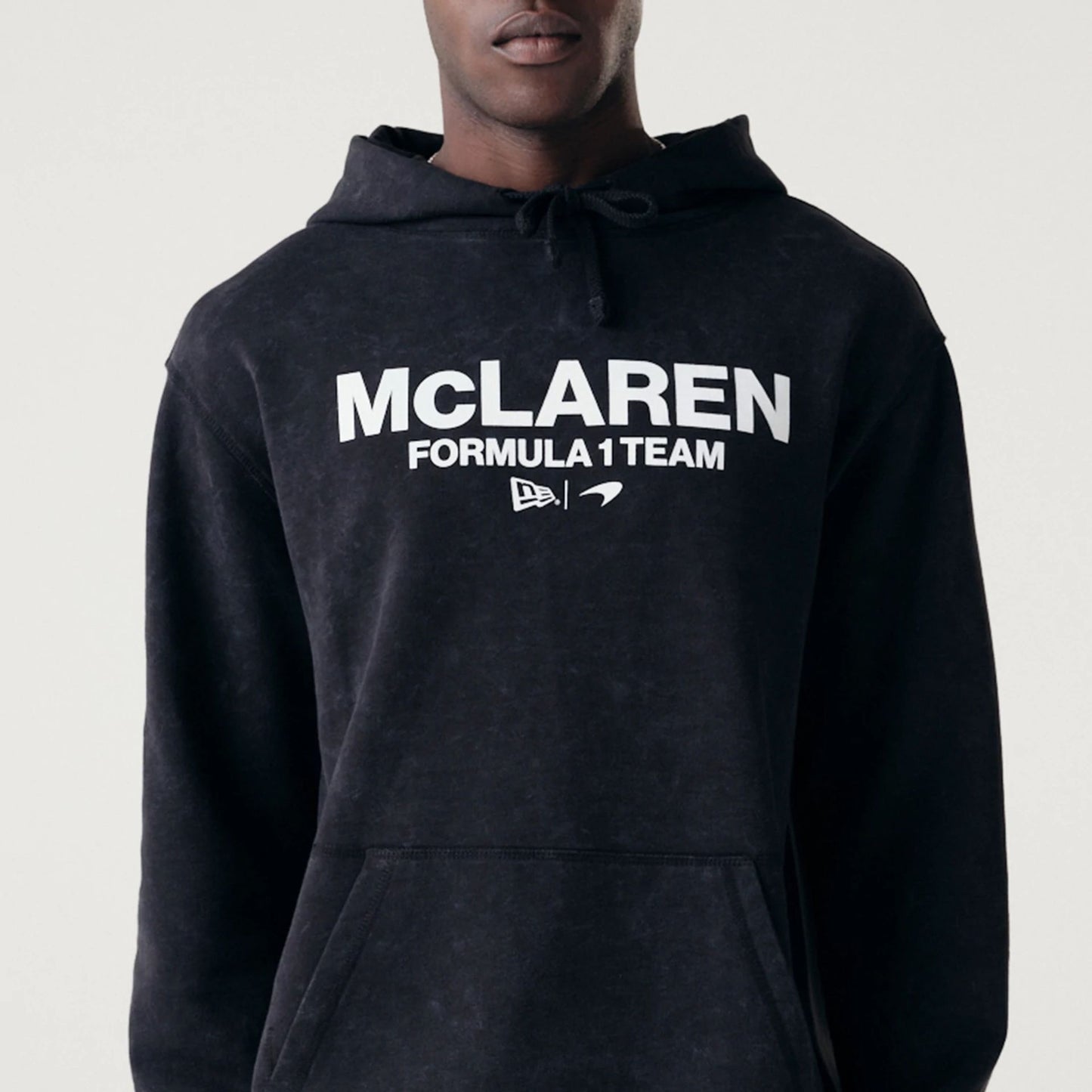 The Male model is wearing McLaren Racing Washed Pack Black Oversized Hoodie 3