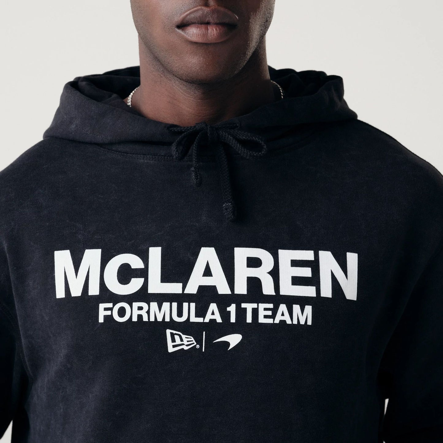 The Male model is wearing McLaren Racing Washed Pack Black Oversized Hoodie 4