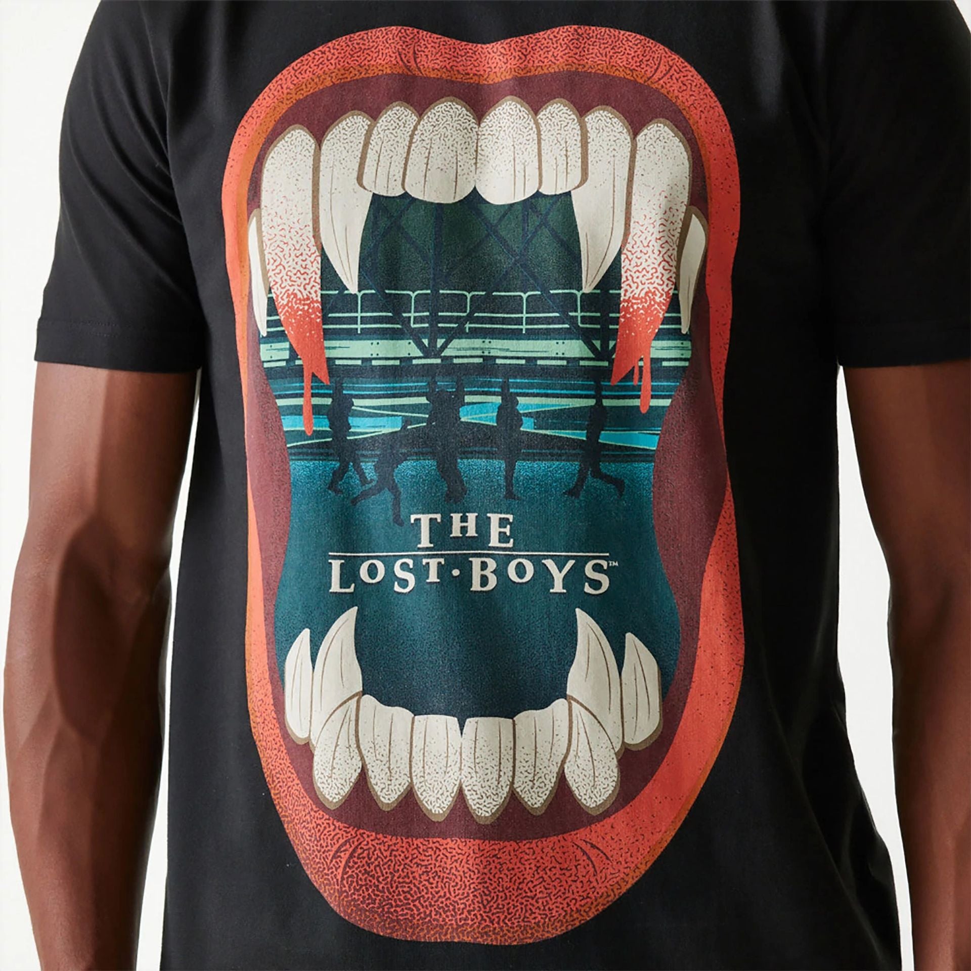 The Male model is wearing The Lost Boys Halloween Horror Black T-Shirt 4