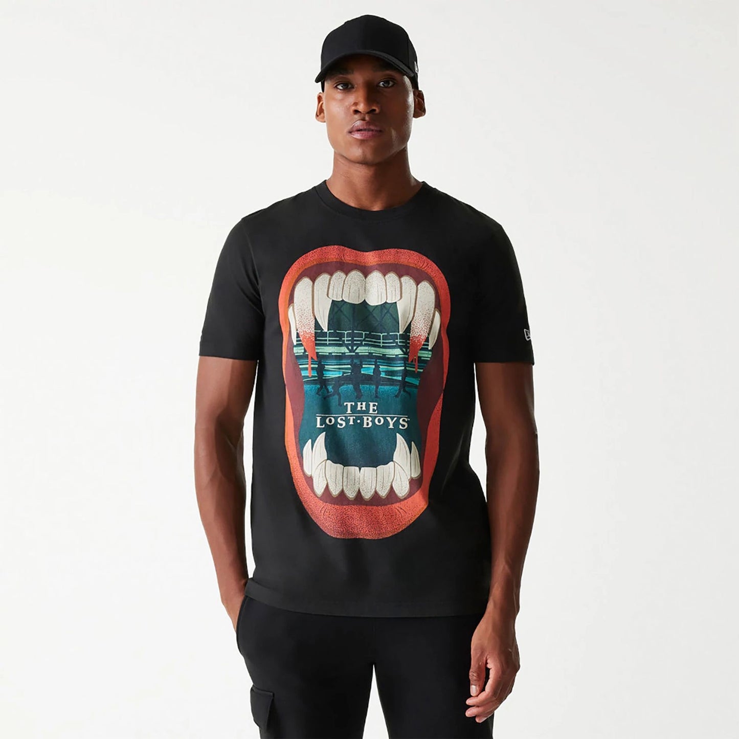 The Male model is wearing The Lost Boys Halloween Horror Black T-Shirt 1