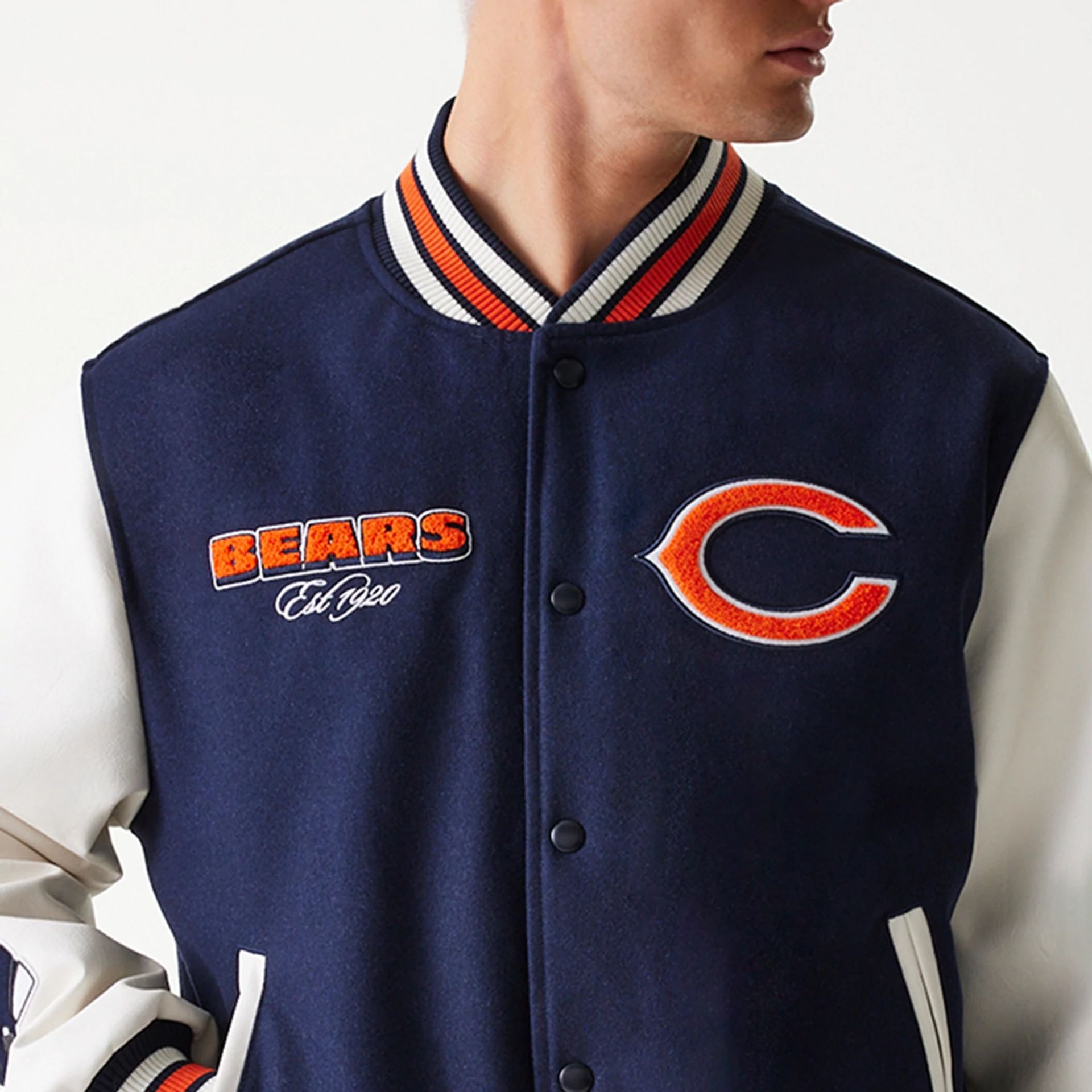 The Male model is wearing Chicago Bears NFL Navy Varsity Jacket 7