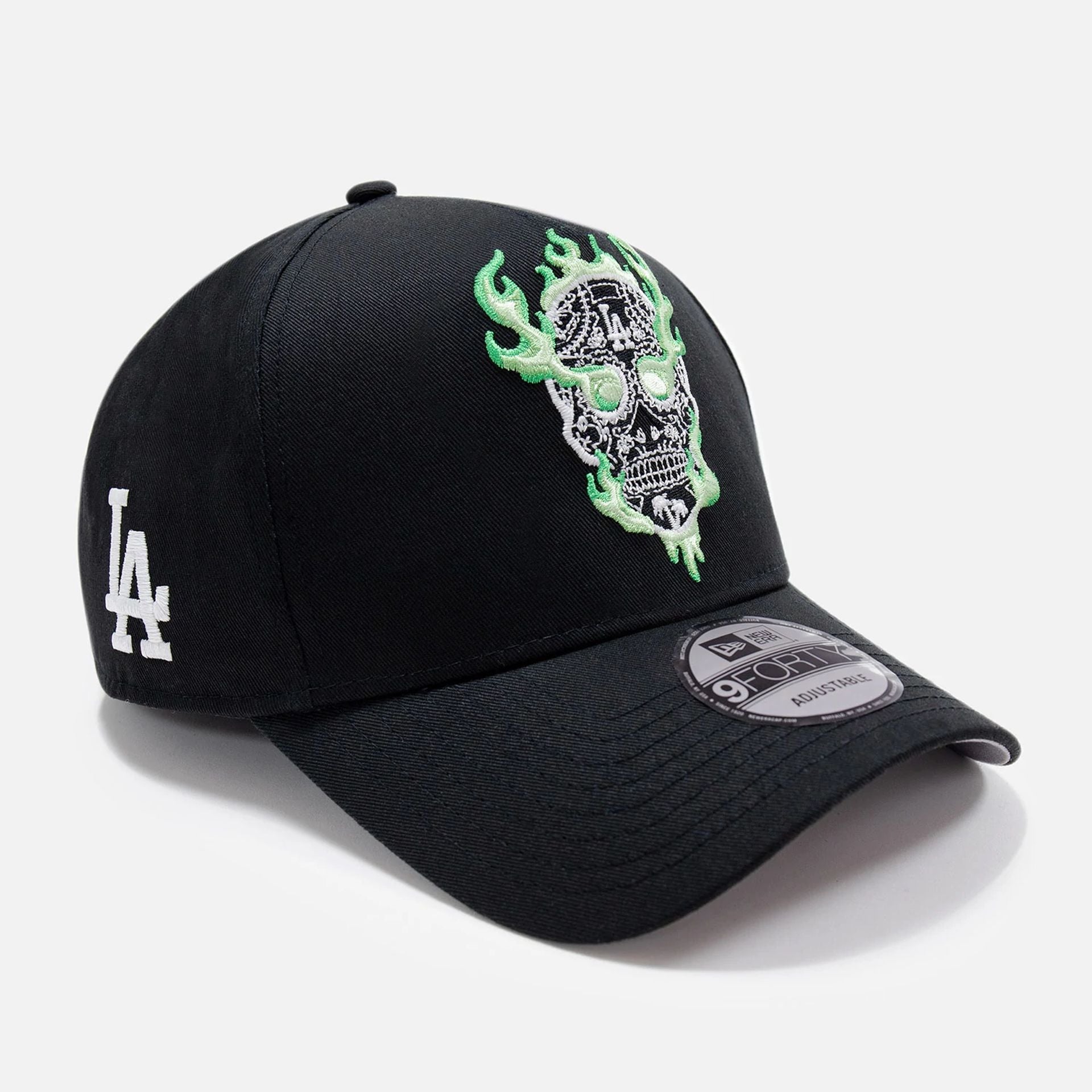 This is a LA Dodgers Glow In The Dark Flaming Skull Black 9FORTY E-Frame Cap 1