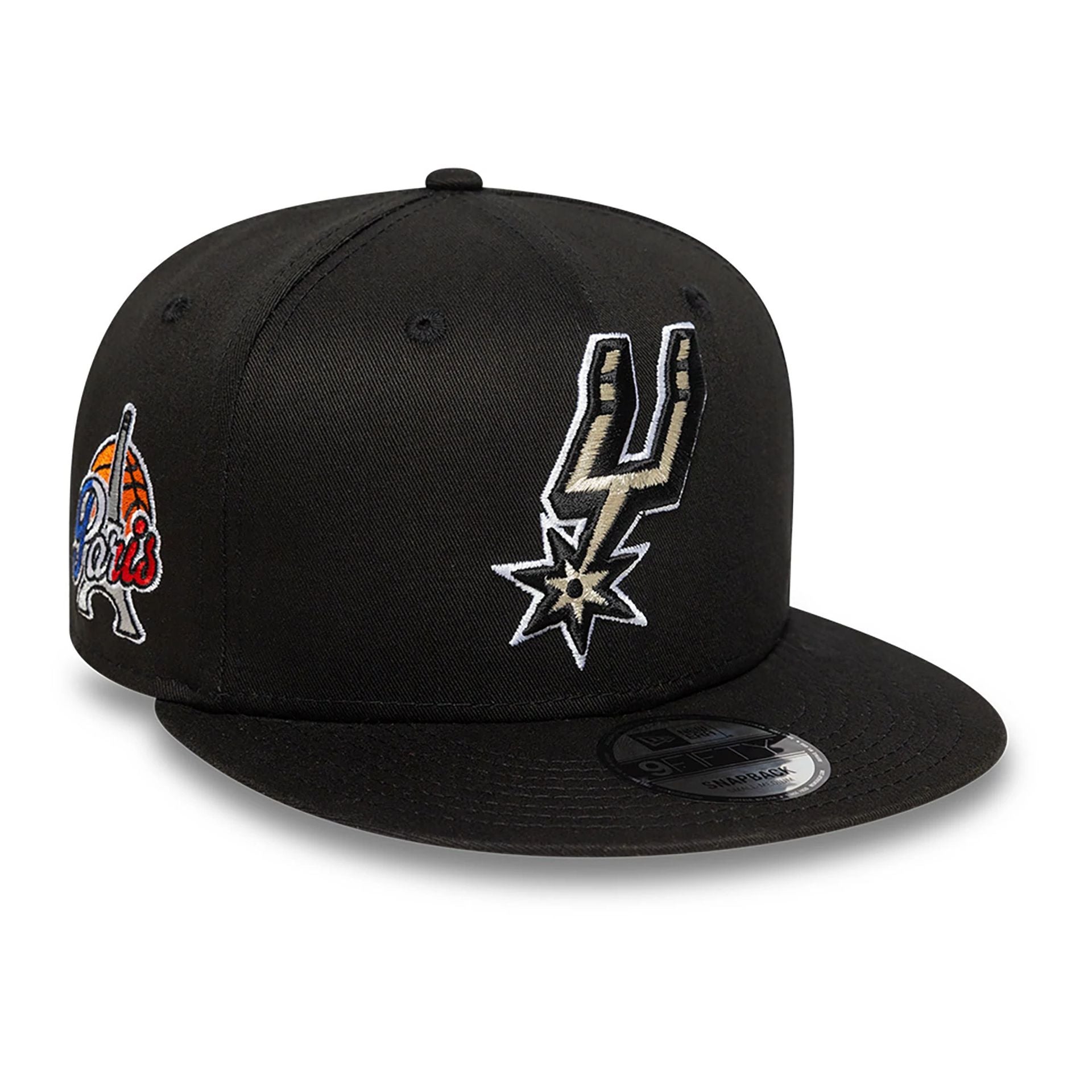 This is a San Antonio Spurs NBA Paris Games 2025 Black 9FIFTY Snapback Cap 1