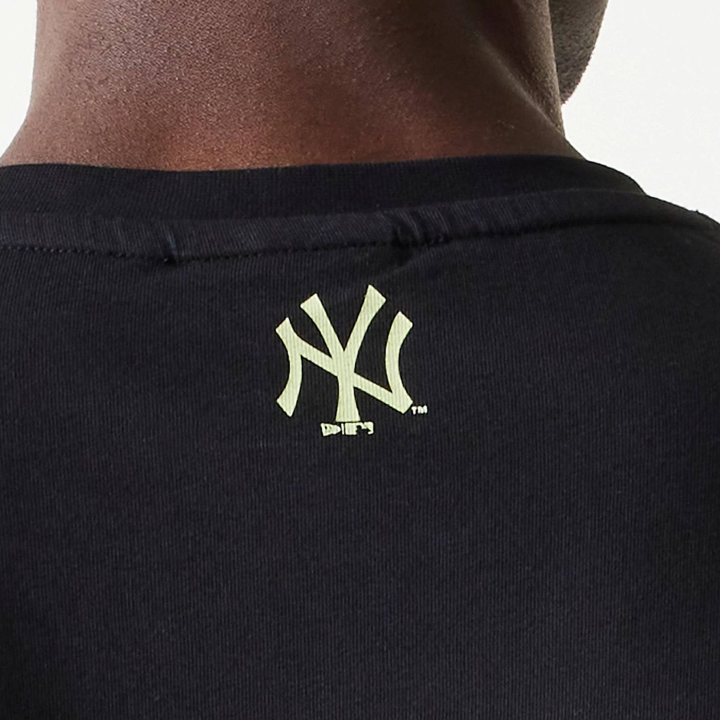 The Male model is wearing New York Yankees MLB Glow Black Oversized T-Shirt 7