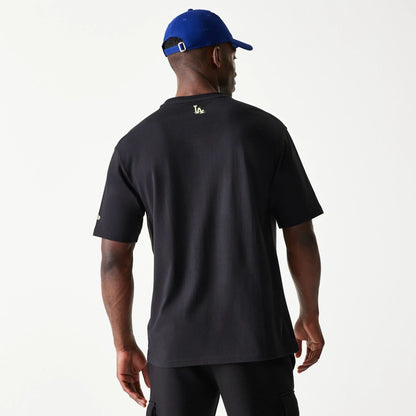 The Male model is wearing LA Dodgers MLB Glow Black Oversized T-Shirt 2