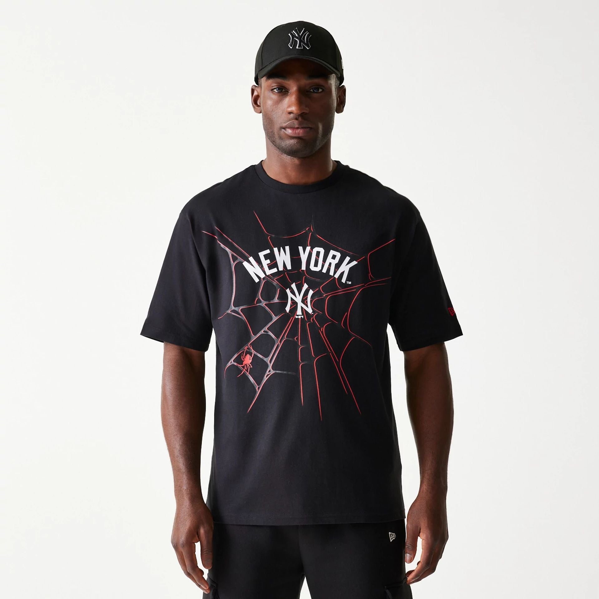 The Male model is wearing New York Yankees Spiderweb Black Oversized T-Shirt 1