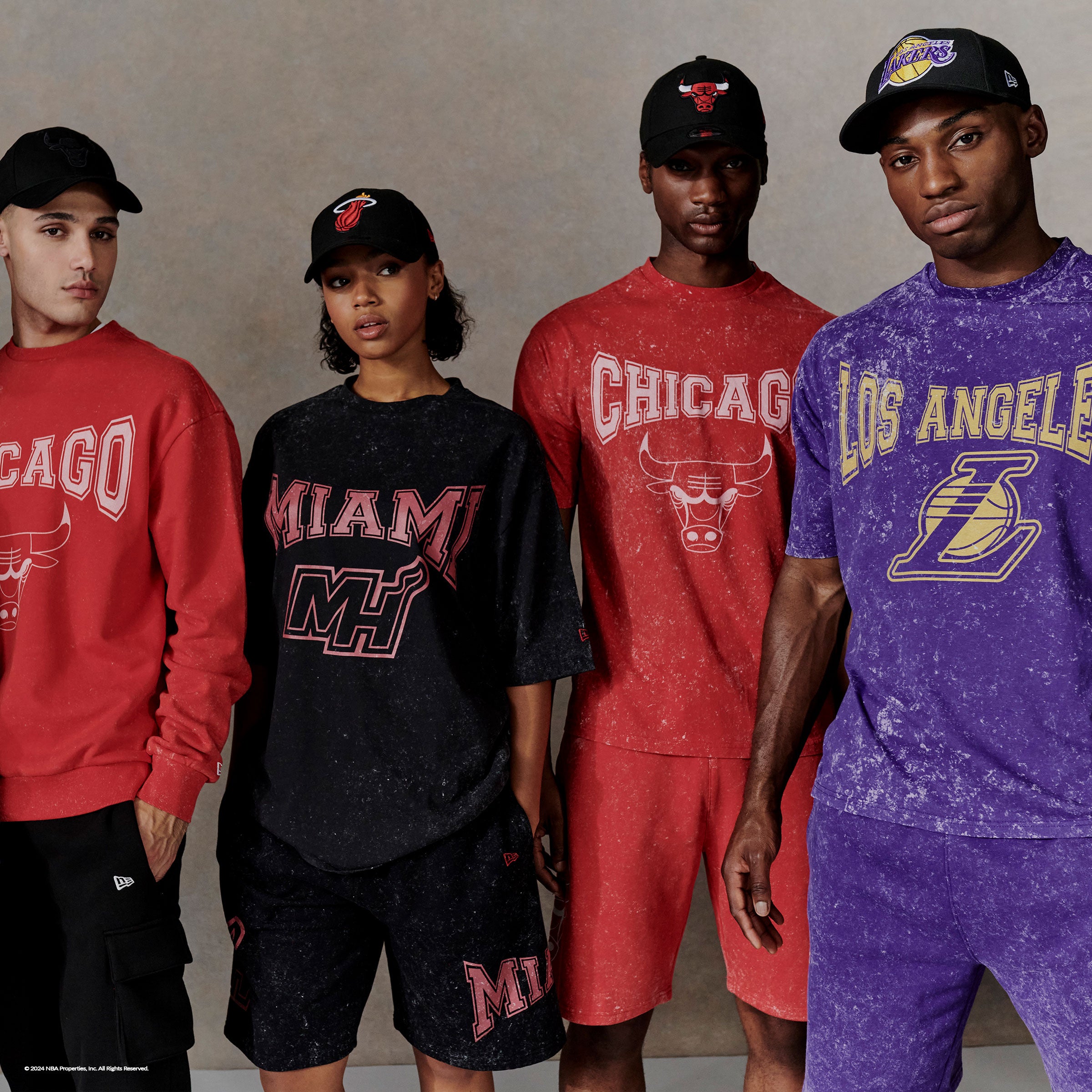 Young adults wearing NBA oversized matching sets 