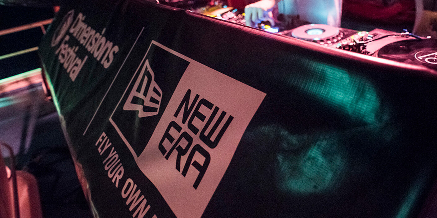 close up of dj mixset from dimensions festival with new era logo