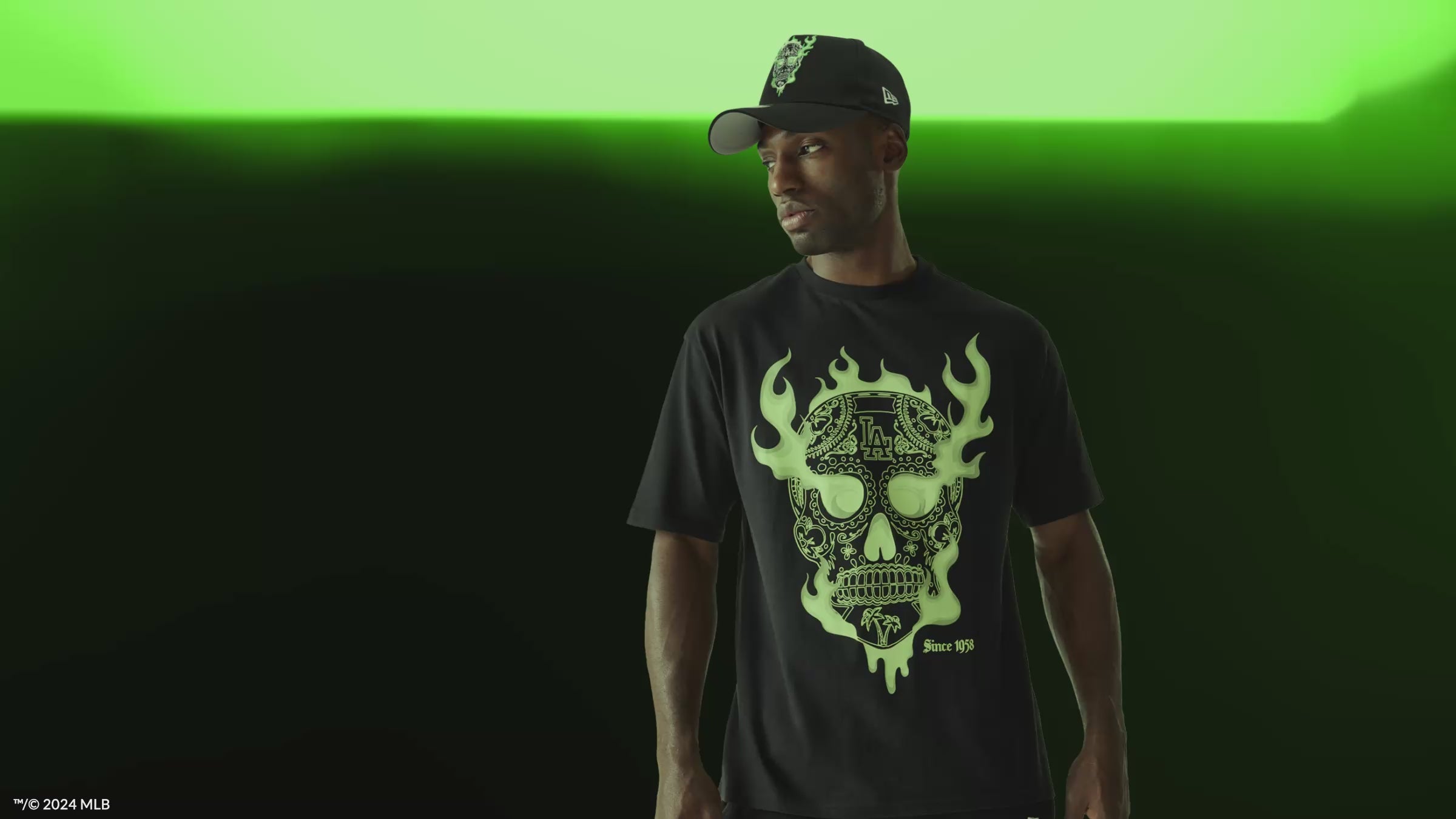 Black t-shirt with green glow in the dark skull.